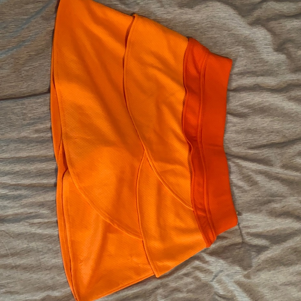 Orange tennis skirt